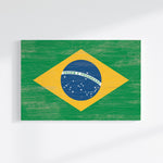 a picture of the flag of brazil painted on a white wall