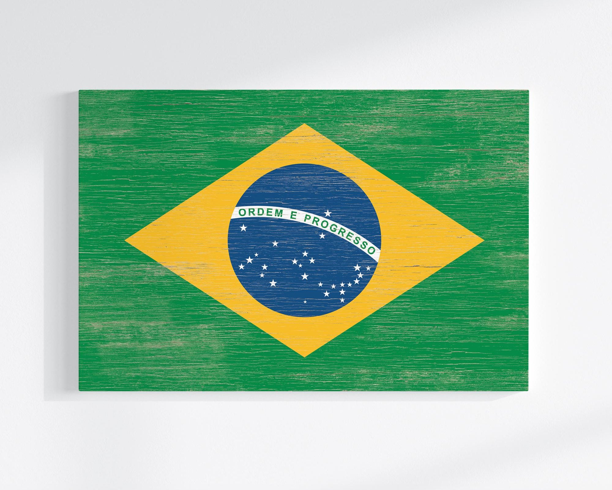a picture of the flag of brazil painted on a white wall