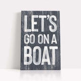 a wooden sign that says let&#39;s go on a boat
