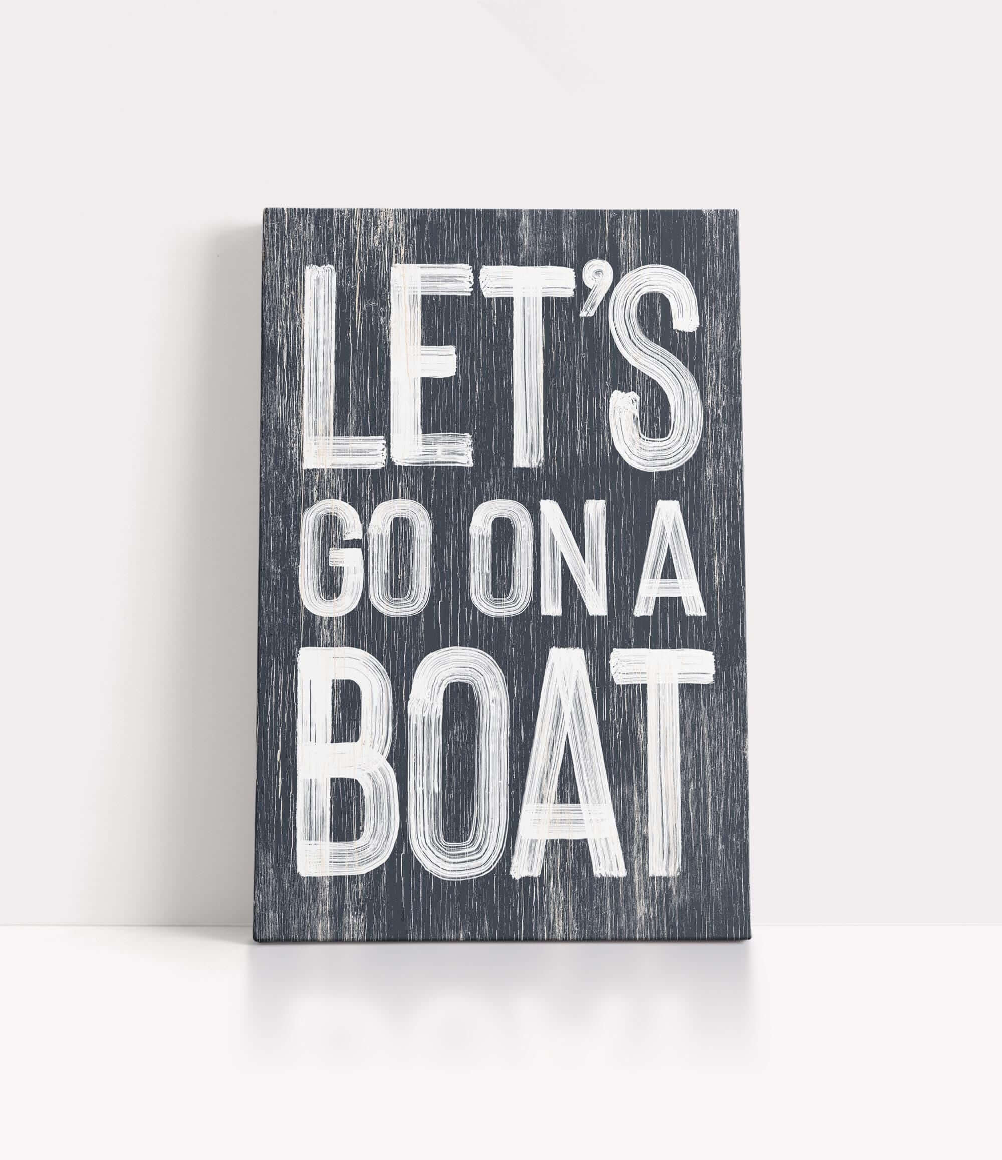 a wooden sign that says let&#39;s go on a boat