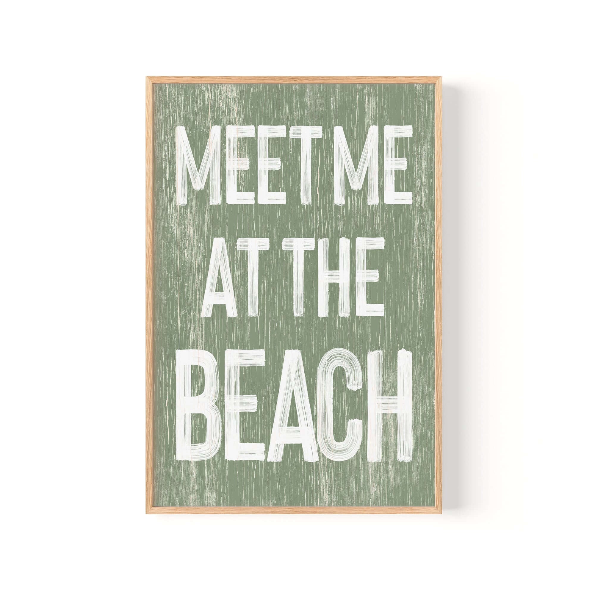 a green and white sign that says meet me at the beach