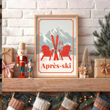 A framed poster of a snowy mountain landscape with a pair of skis and two red Adirondack chairs, placed on a wooden shelf above a collection of Christmas stockings.