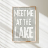 a sign that says meet me at the lake