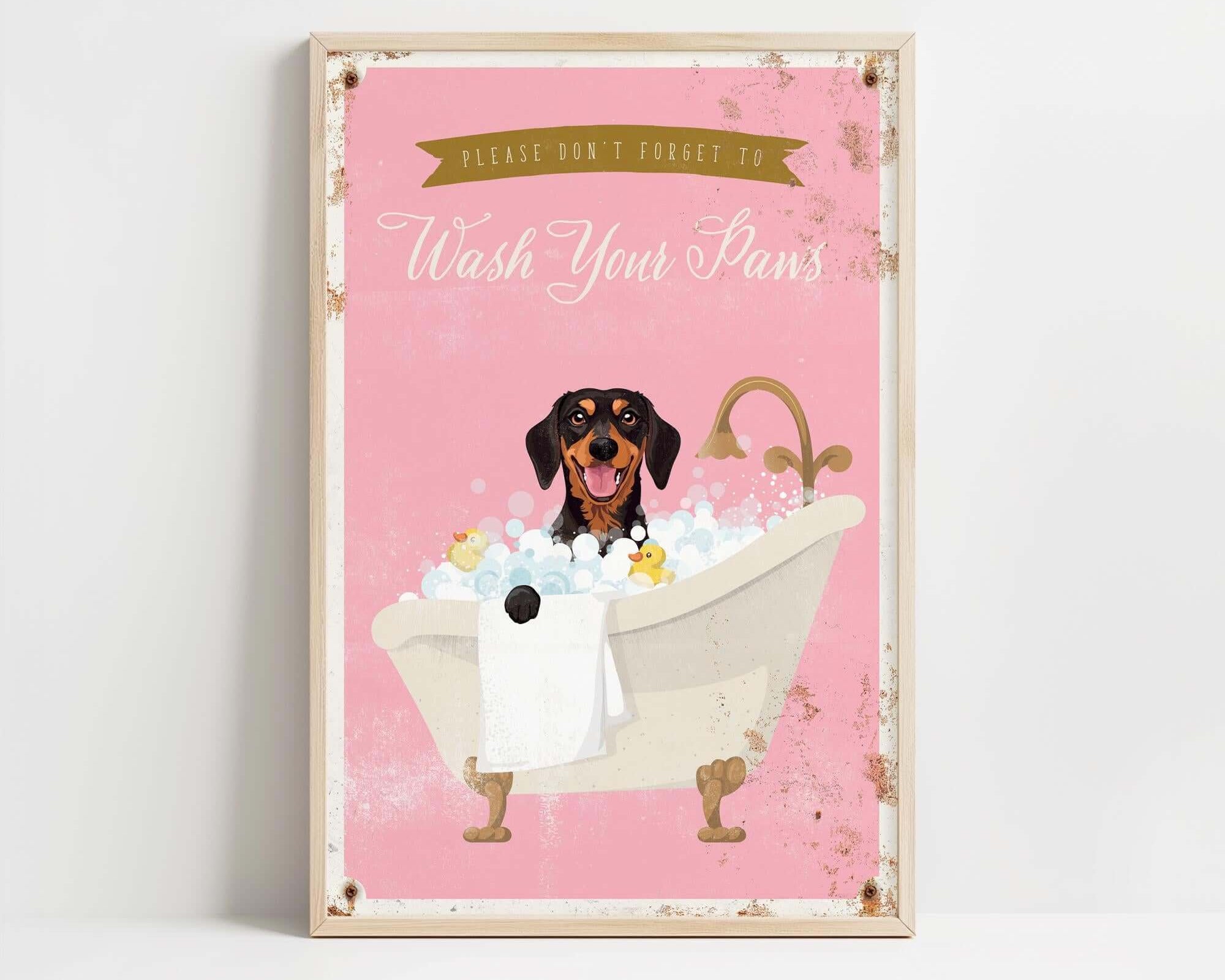 A framed poster with a dog sitting in a bathtub filled with bubbles, accompanied by the text "Please don't forget to wash your paws".