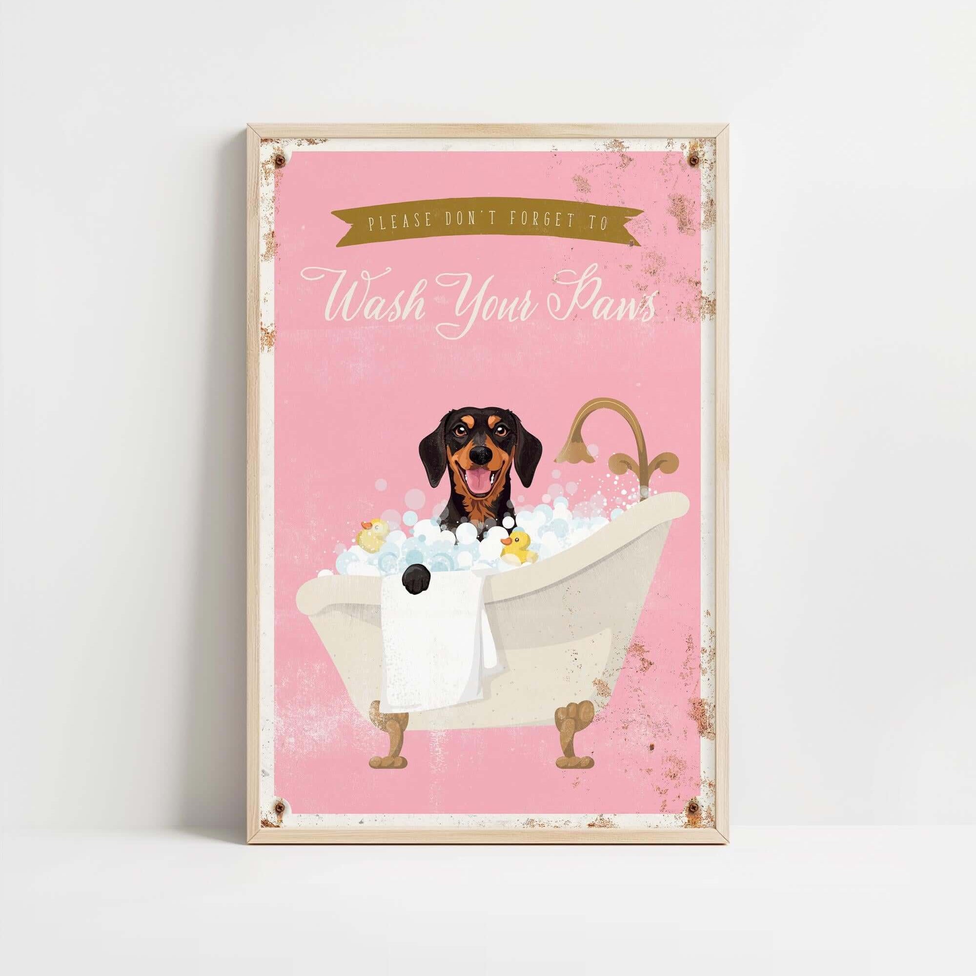 A framed poster with a dog sitting in a bathtub filled with bubbles, accompanied by the text "Please don't forget to wash your paws".