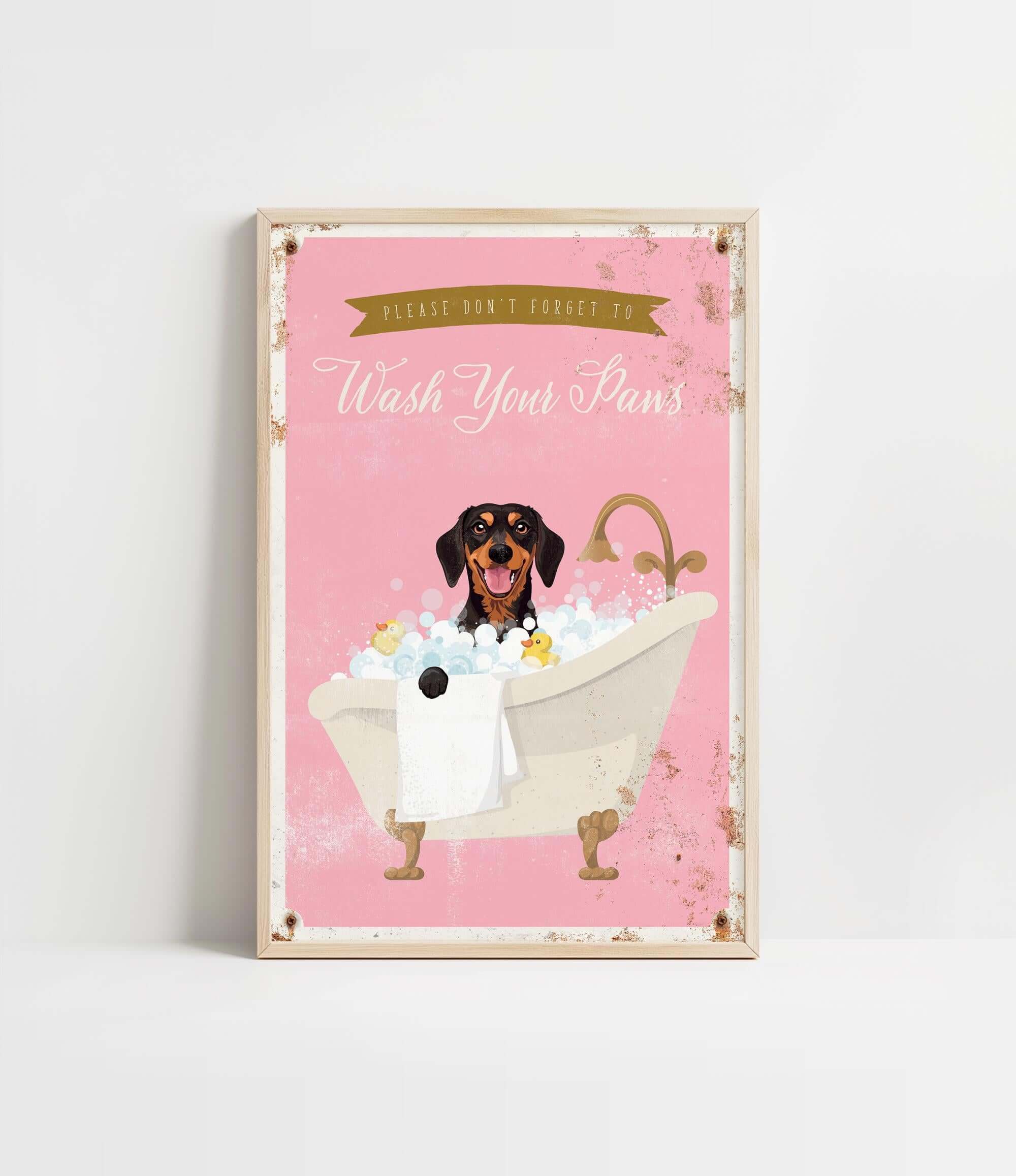 A framed poster with a dog sitting in a bathtub filled with bubbles, accompanied by the text "Please don't forget to wash your paws".
