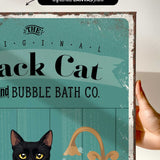 a black cat and bubble bath co sign