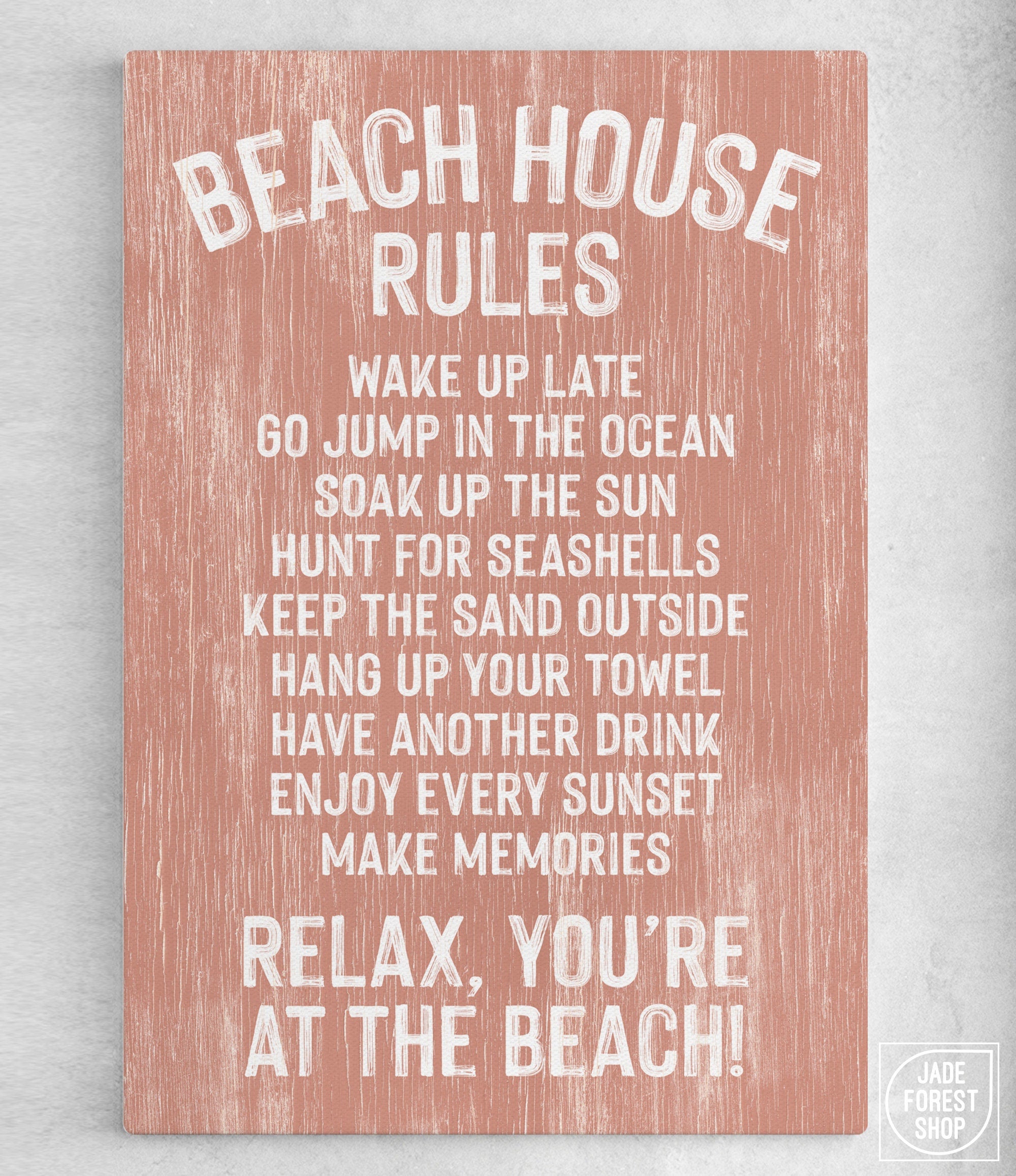 The Beach House Rules Sign, Painted Wood, Coral features beach house wall decor ideas like relaxing, waking up late, jumping in the ocean, and enjoying every sunset.