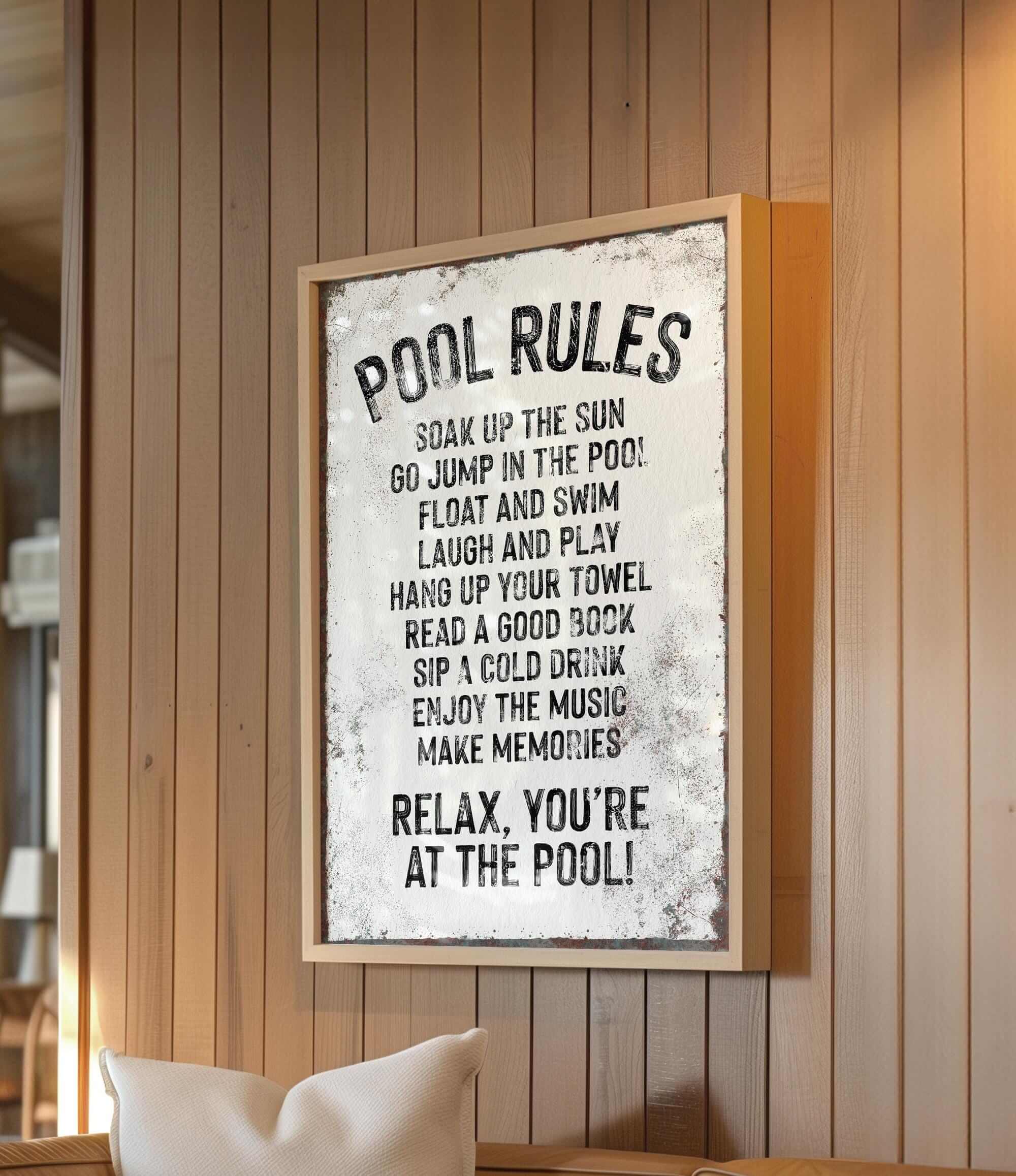 a picture of a pool rules sign hanging on a wall