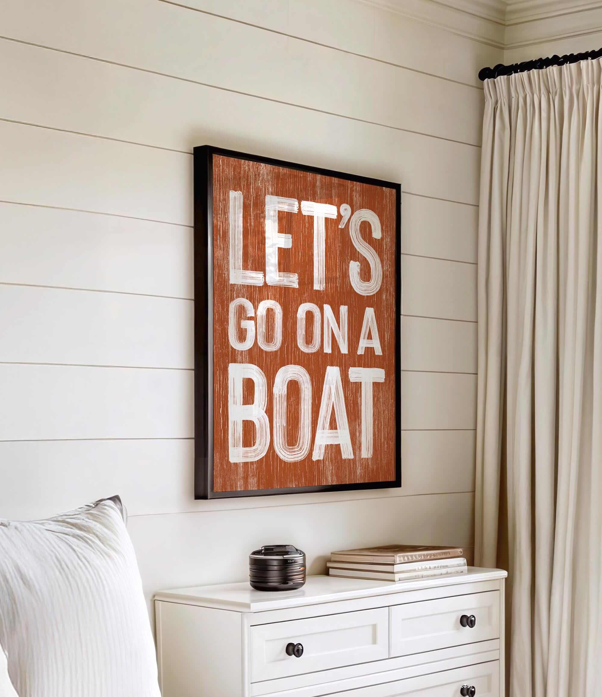 a bedroom with a white dresser and a wooden sign on the wall