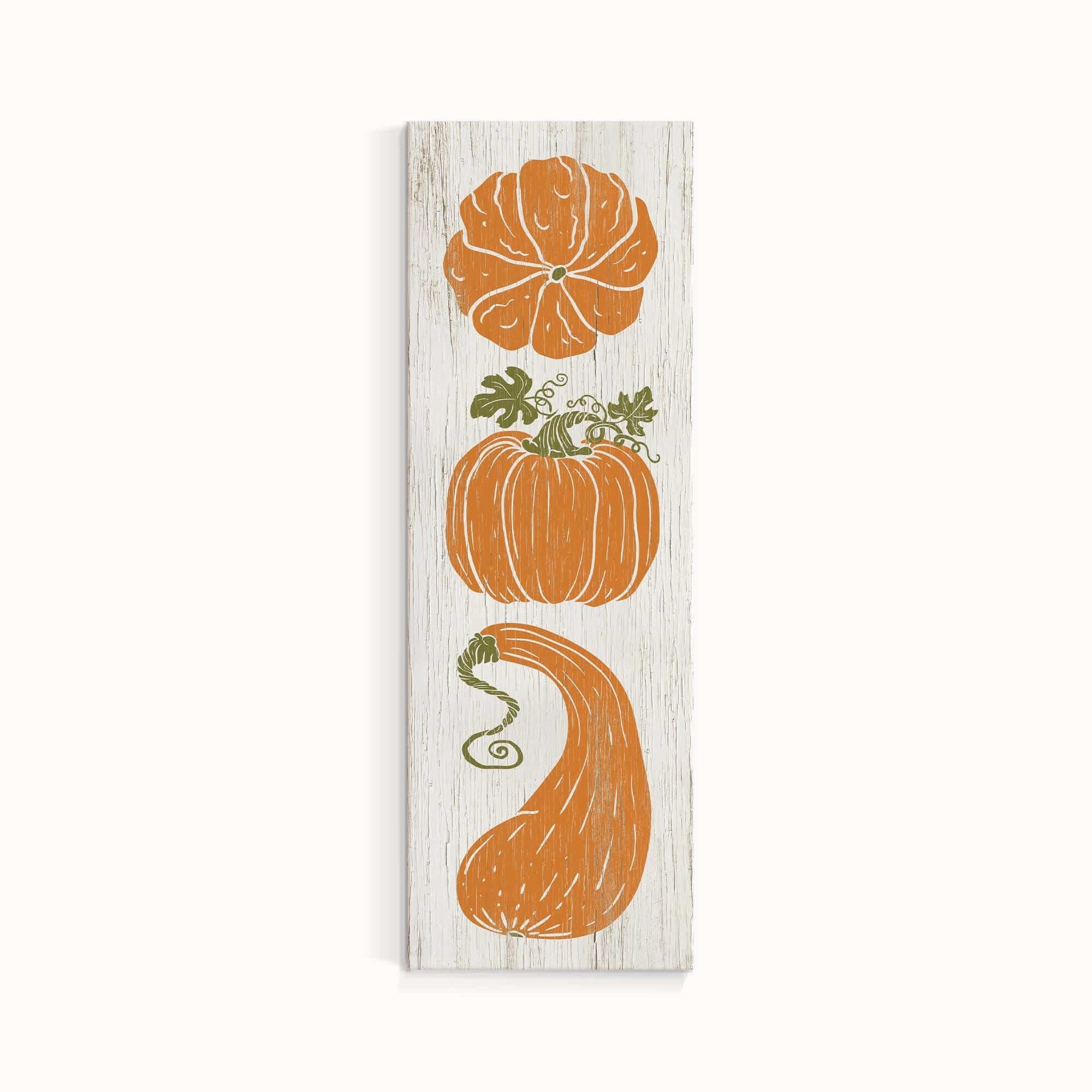 a wooden sign with three pumpkins on it