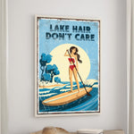 a woman paddleboarding on a lake, with the text "LAKESHAIR DON'T CARE" displayed above her.