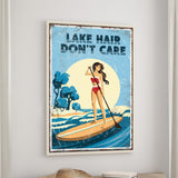 a woman paddleboarding on a lake, with the text "LAKESHAIR DON'T CARE" displayed above her.