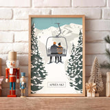 A framed illustration of a couple on a ski lift, surrounded by snow-covered pine trees, is displayed on a shelf with a nutcracker and other holiday decorations.