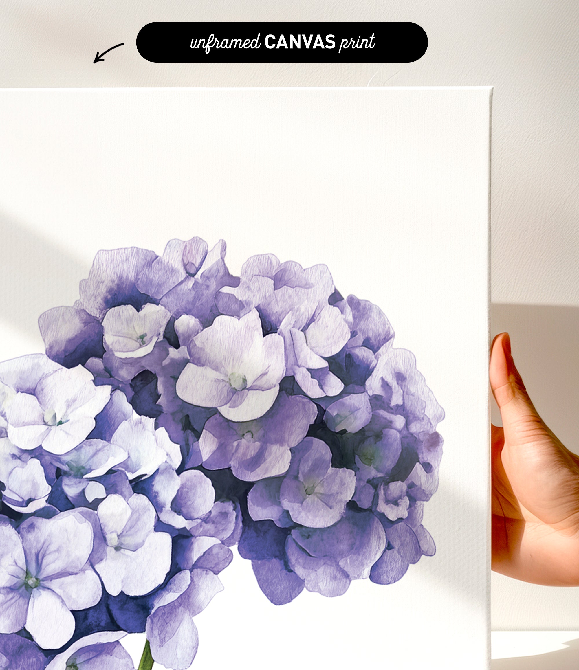 a close-up of a white canvas with a vibrant purple flower depicted on it.