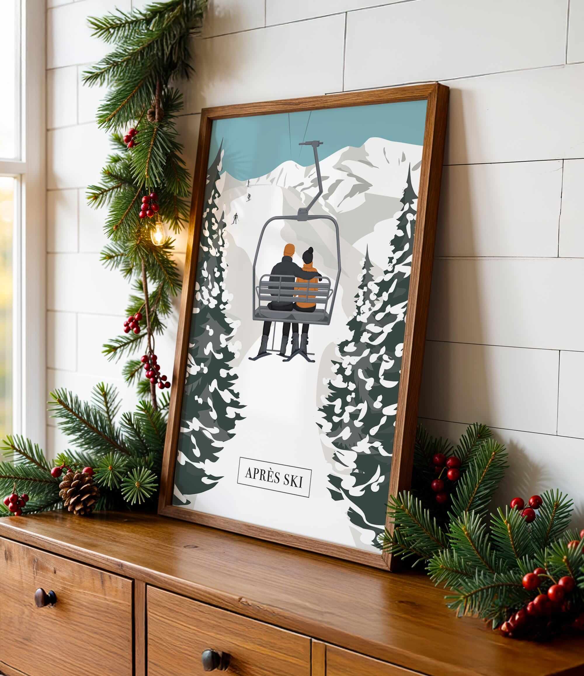 A framed illustration of a ski lift carrying two people is displayed on a wooden dresser, surrounded by Christmas decorations.