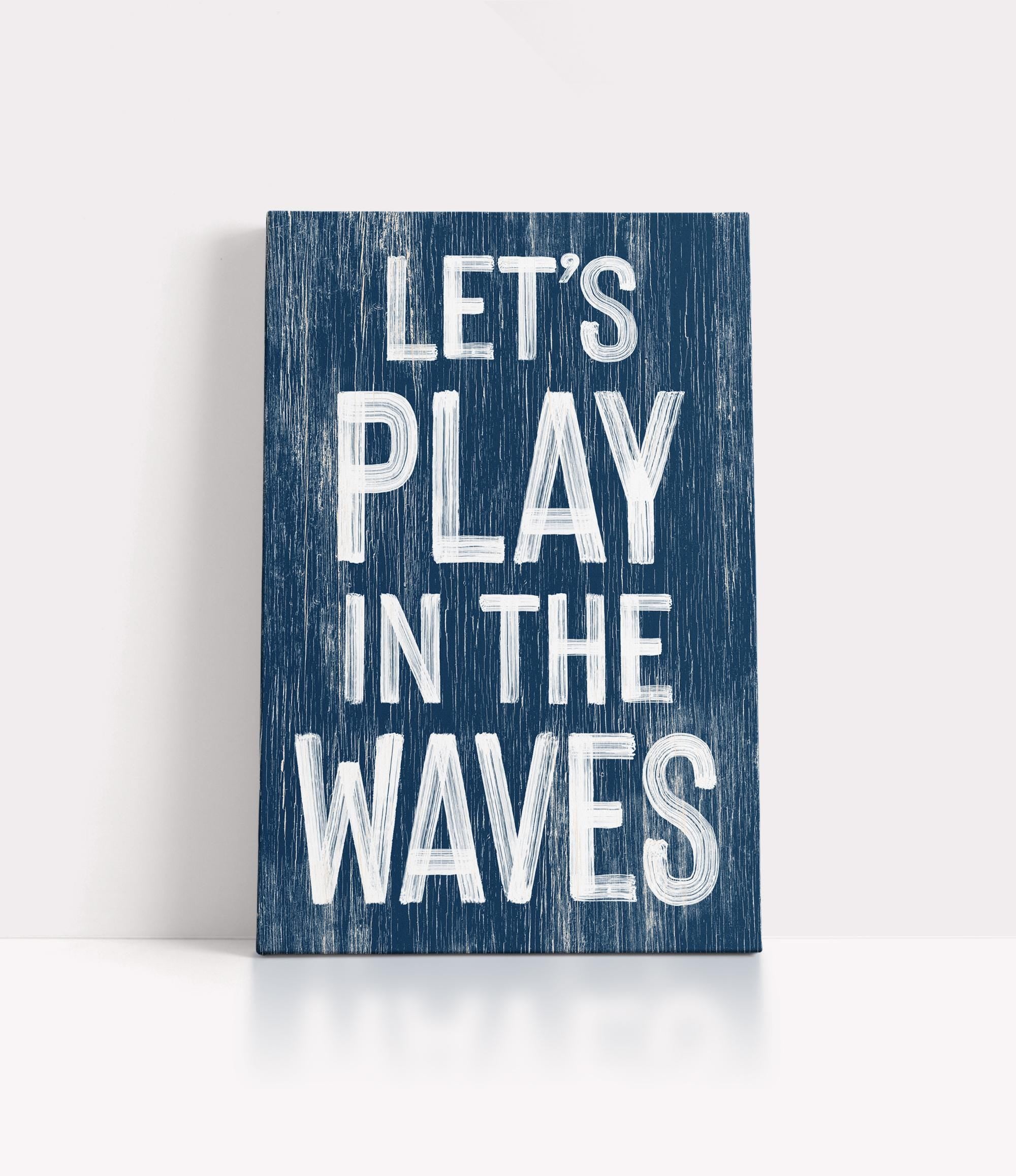 a wooden sign that says let&#39;s play in the waves
