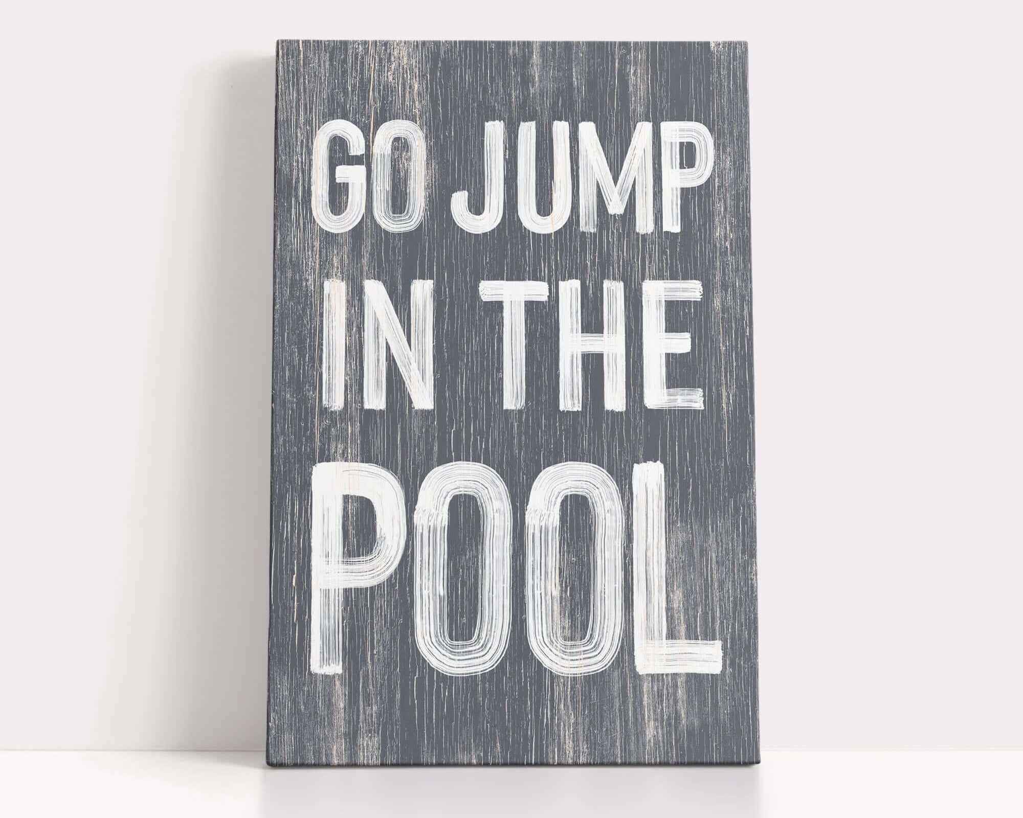 a sign that says go jump in the pool