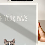 a gray and white cat with blue eyes, and the text "Witch Your Paws" is displayed on the canvas print.