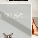a gray and white cat with blue eyes, and the text "Witch Your Paws" is displayed on the canvas print.