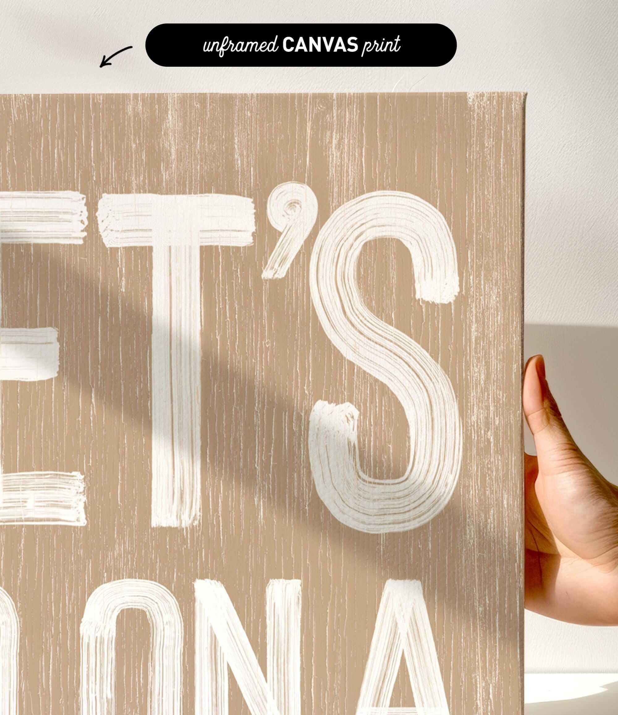 a person holding up a sign that says let&#39;s it&#39;s bona