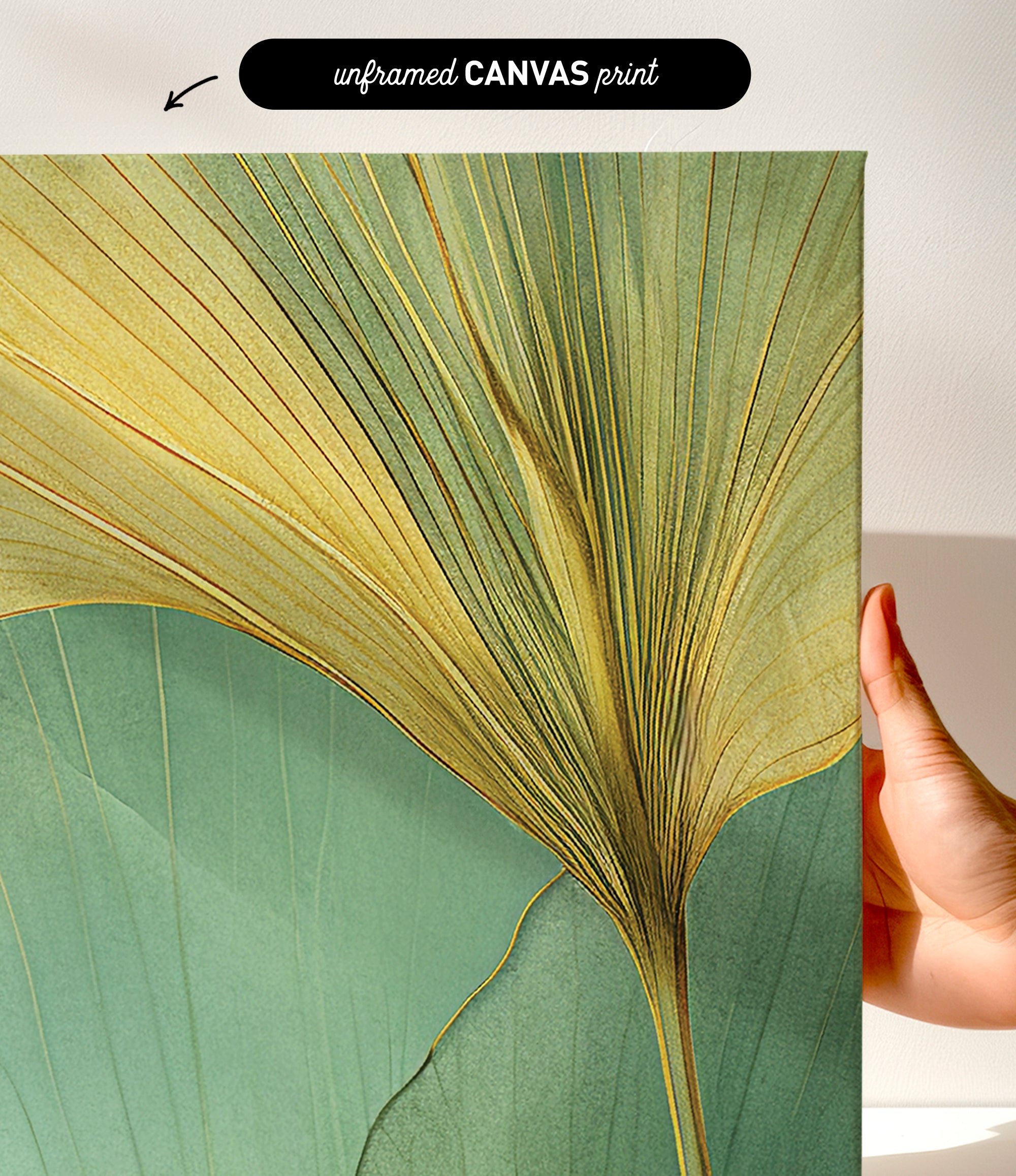 a close-up view of a vibrant green leaf with intricate patterns, held up against a white background.