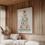 a living room with a christmas tree on the wall