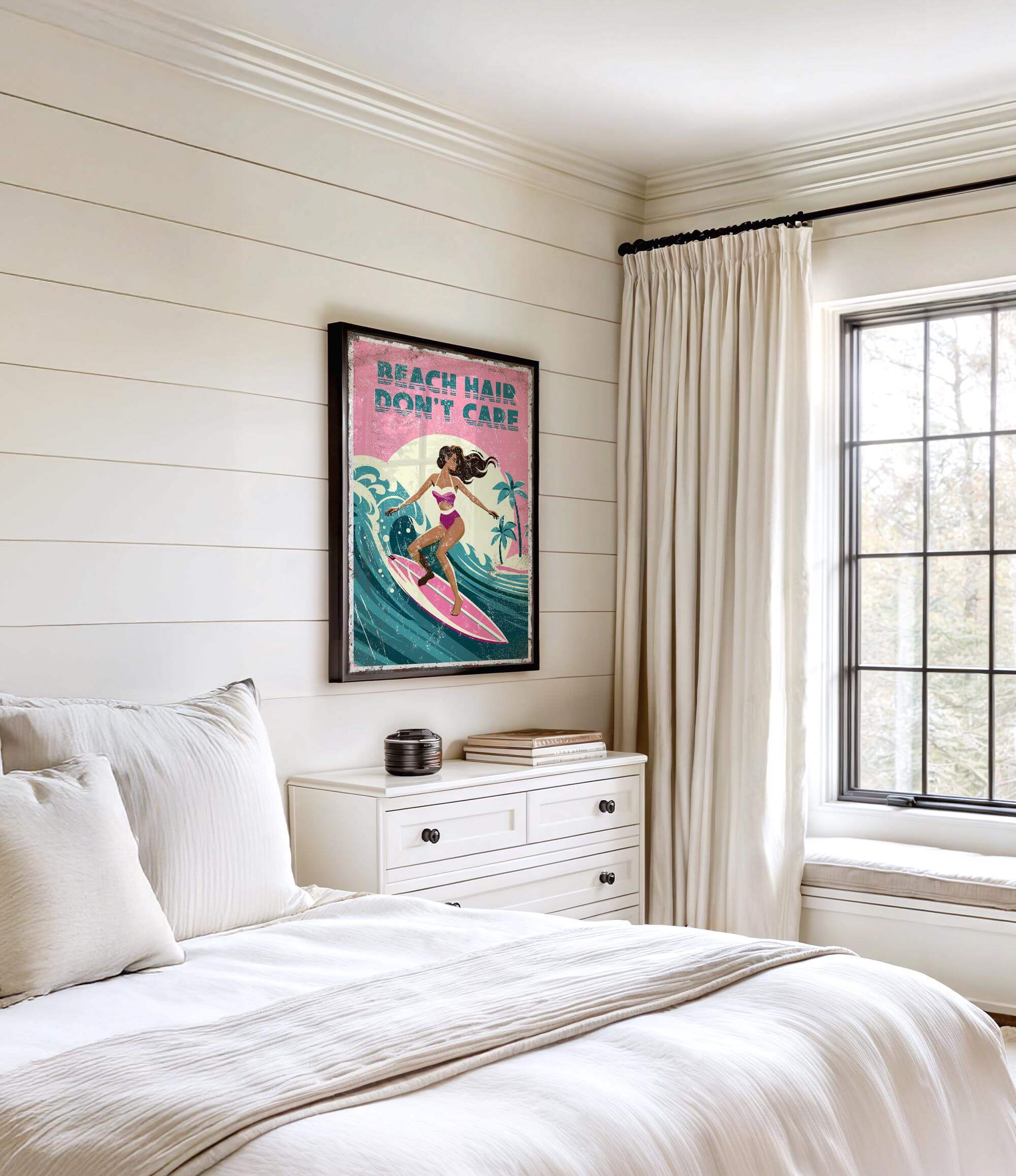 a bedroom with a bed, a dresser, and a window. There is a poster of a woman surfing on the wall above the bed.