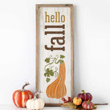 a sign that says hello fall with pumpkins and gourds