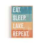 a wooden sign that says eat sleep lake repeat