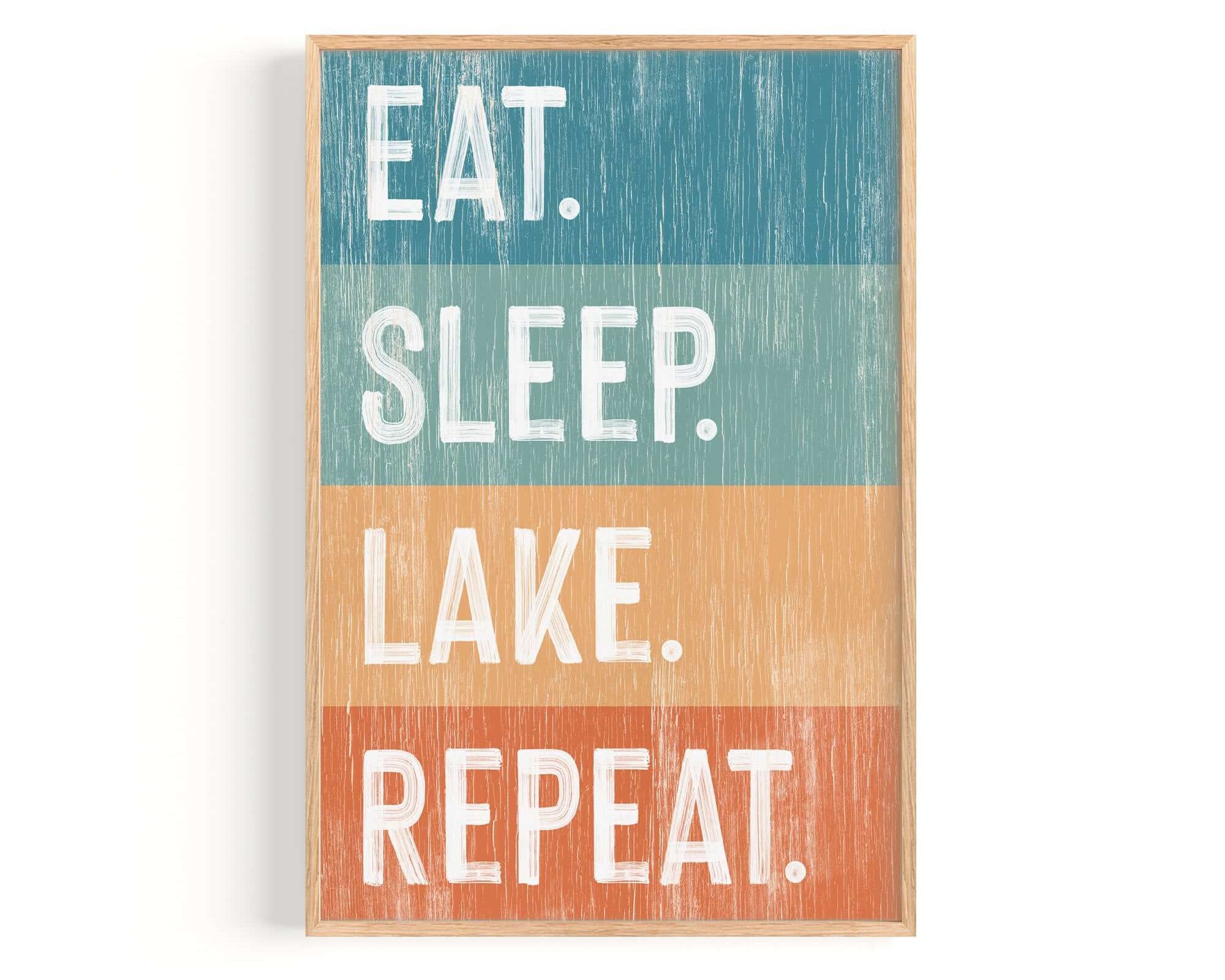 a wooden sign that says eat sleep lake repeat