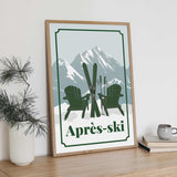 A framed poster with a mountain landscape and two green chairs, along with the text "Apres-skii" (Skiing) in the bottom right corner.