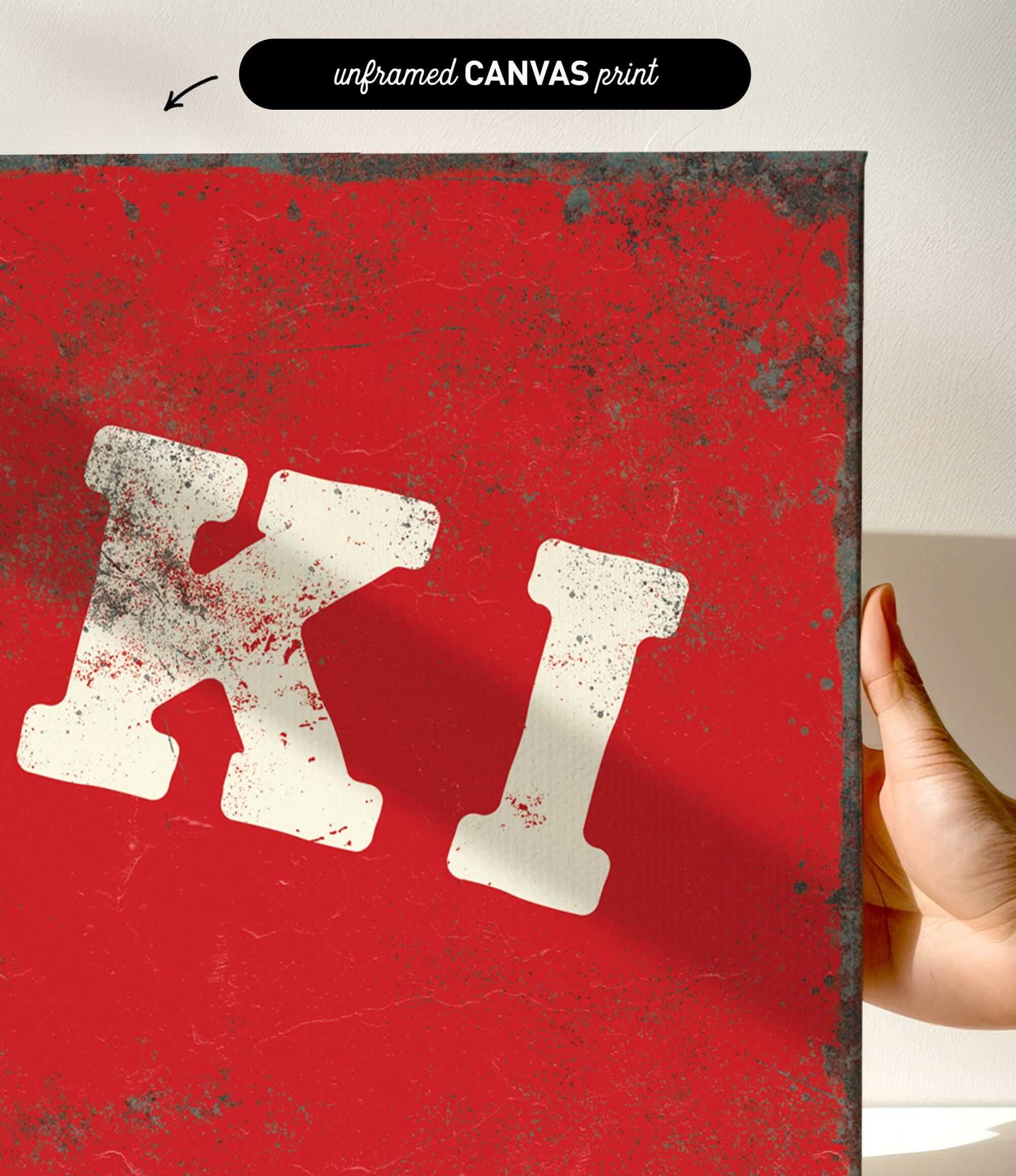 a red background with a large white letter "K" prominently displayed.