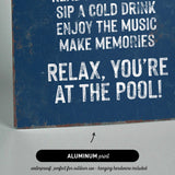 a sign that reads relax you&#39;re at the pool