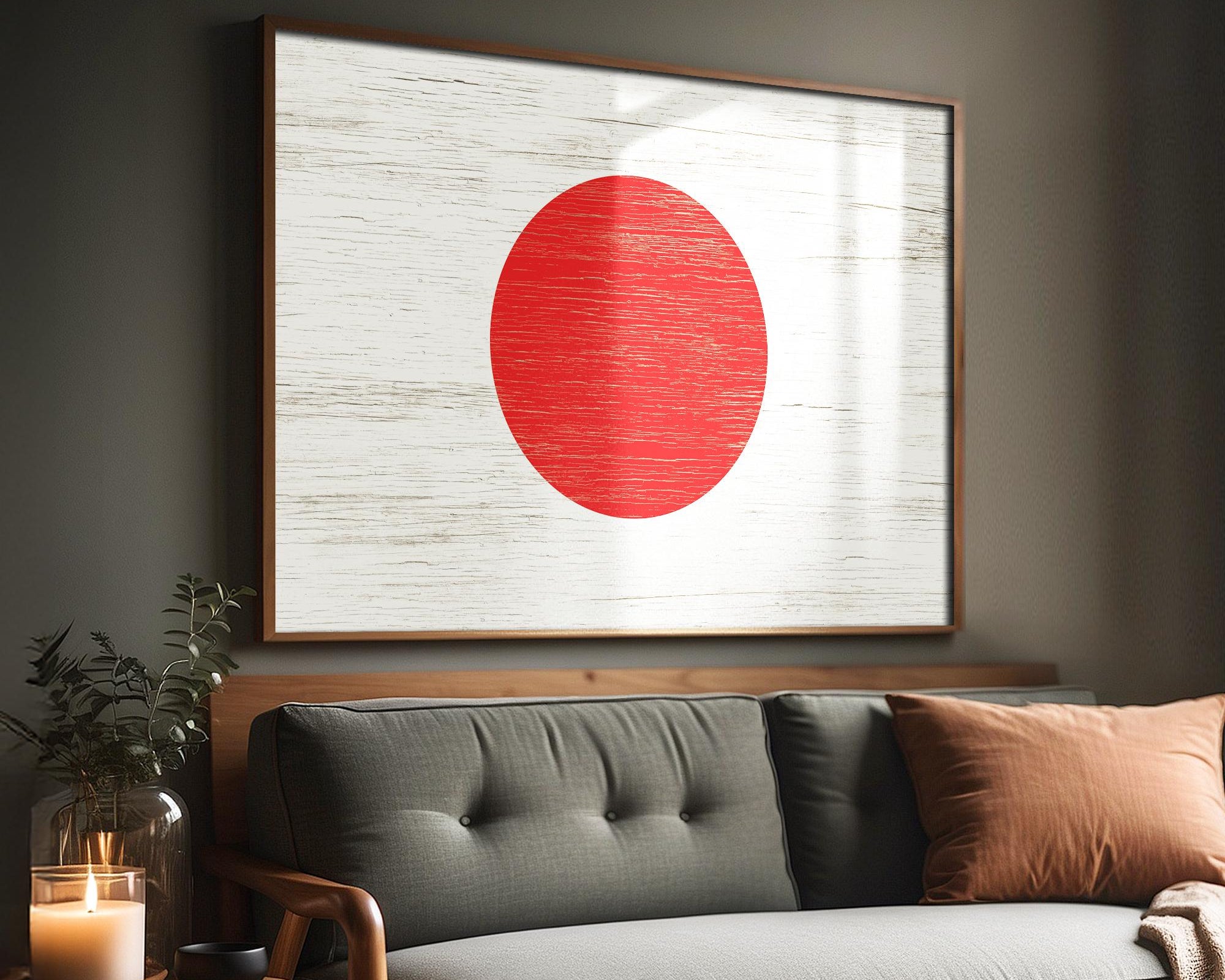 a living room with a couch and a painting on the wall