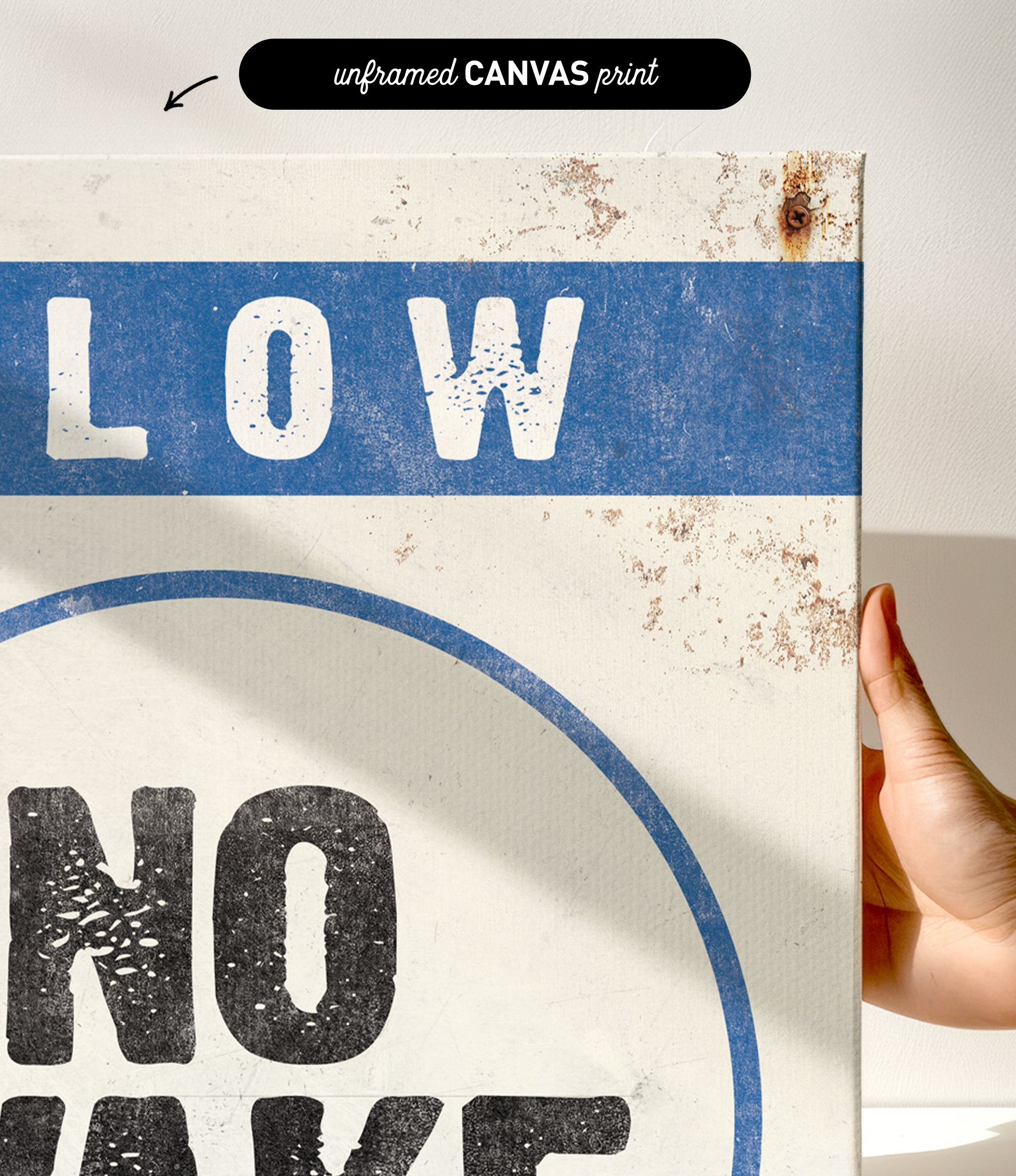 a hand holding a sign that says slow no wave