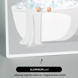 a cat sitting in a bathtub filled with bubbles, with its paws hanging over the edge.
