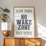 a poster on a wall above a dresser