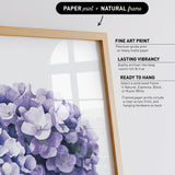 a close-up of a bunch of purple flowers, with a wooden frame surrounding them.