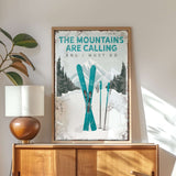 a poster of skis on a wall above a dresser