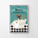 A vintage-style advertisement for a dog-themed bath product called "Boxer Soap and Bubble Bath Co." featuring a brown dog sitting in a bathtub filled with bubbles.