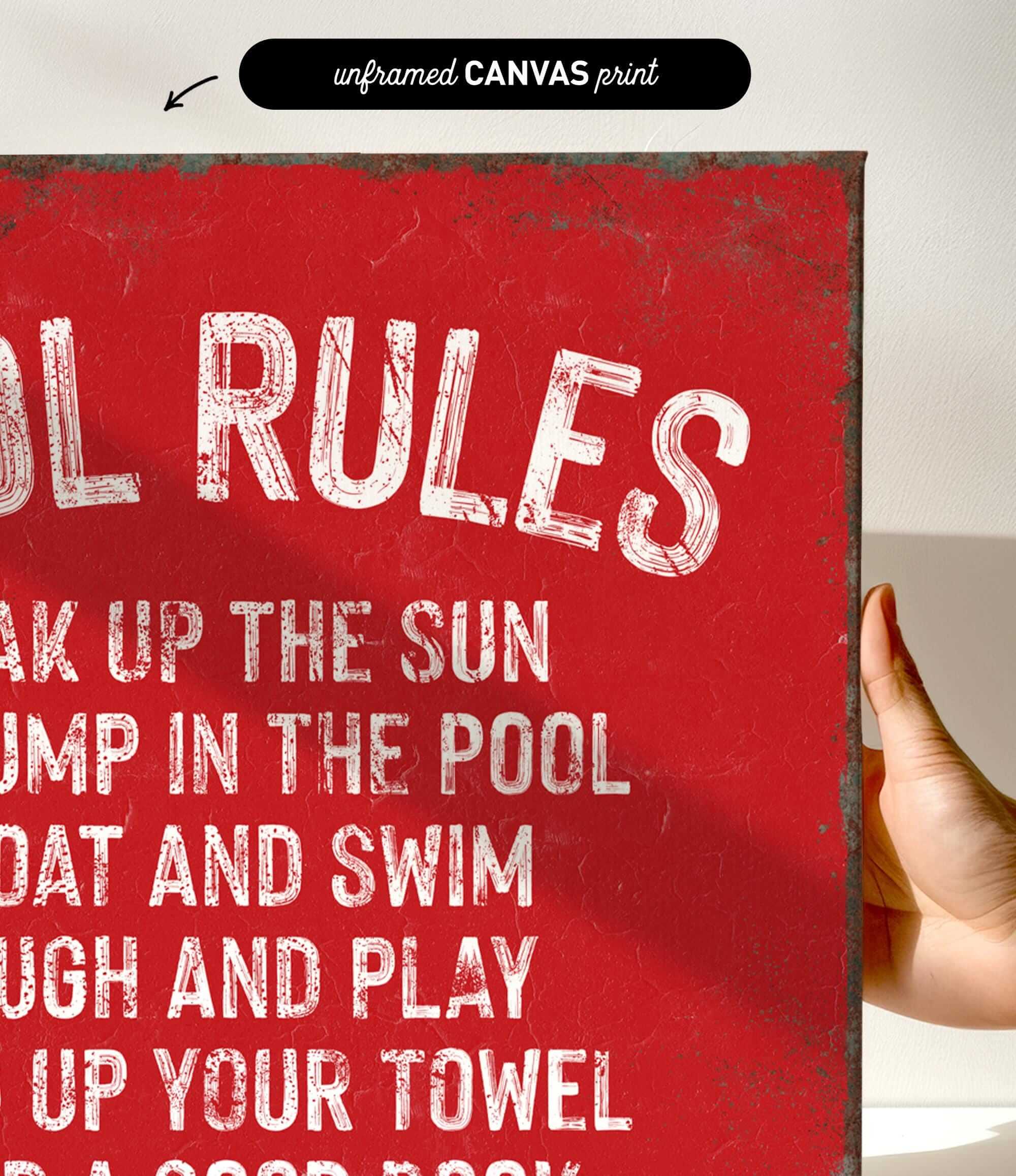 a hand holding a sign that says pool rules