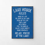 a blue sign that says lake house rules