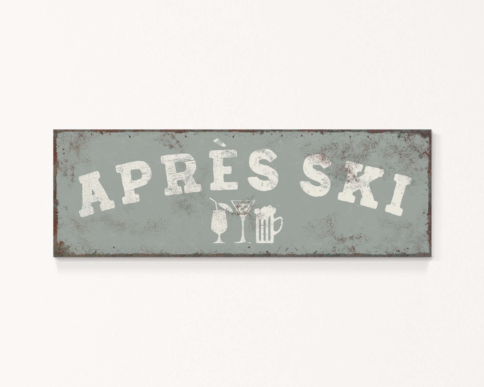 A rectangular sign with the text "APRÈS SKI" in white letters.
