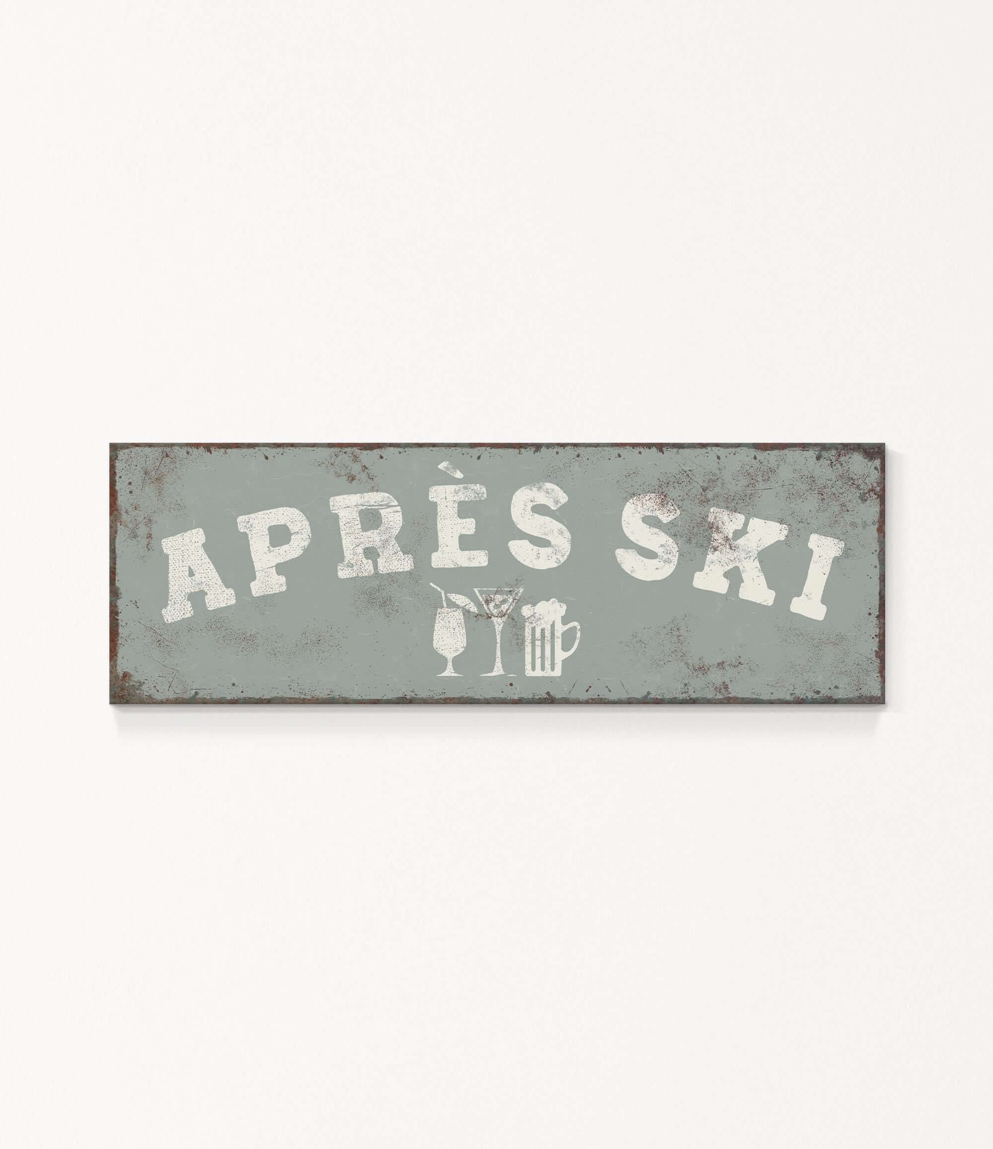 A rectangular sign with the text "APRÈS SKI" in white letters.