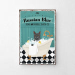 A vintage-style poster advertising "Russian Blue Soap and Bubble Bath Co.", featuring a cat sitting in a bathtub filled with bubbles.