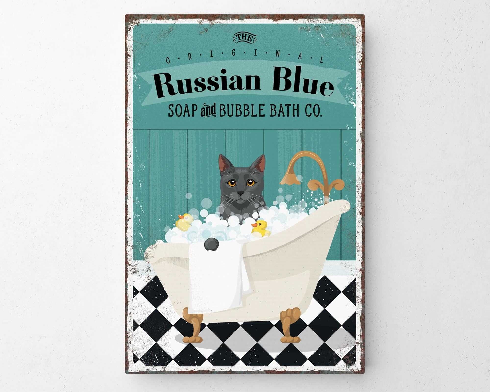 A vintage-style poster advertising "Russian Blue Soap and Bubble Bath Co.", featuring a cat sitting in a bathtub filled with bubbles.