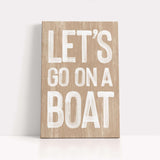 a wooden sign that says let&#39;s go on a boat