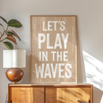 a wooden sign that says let&#39;s play in the waves