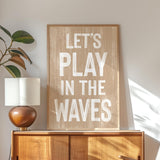 a wooden sign that says let&#39;s play in the waves